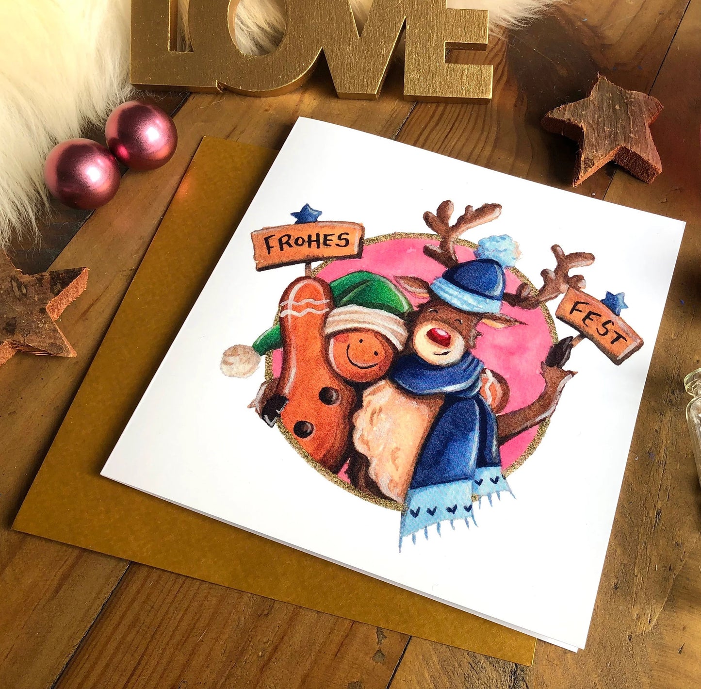 Quadratische Klappkarte "Rentier und Lebuchenmännchen"
