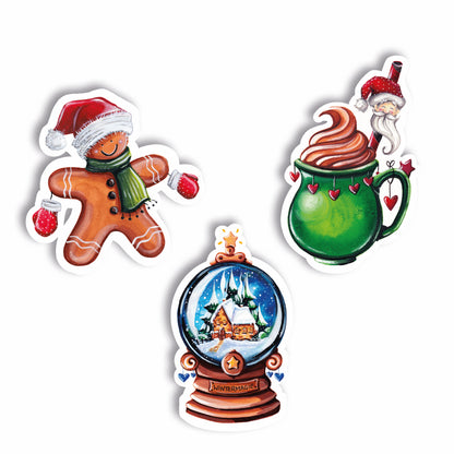 Drei süße weihnachtliche Glitzersticker im Set mit Lebkuchenmännchen, Schneekugel und Weihnachtsmann-Trinkschokolade